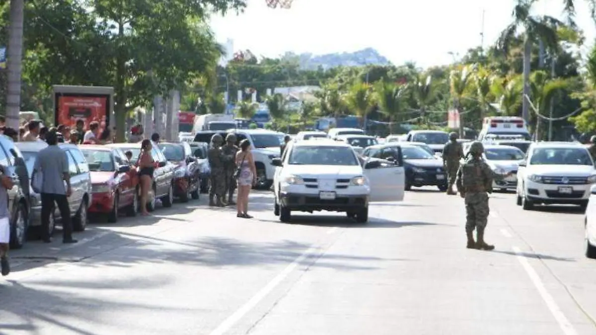 Homicido en plena costera camioneta blanca